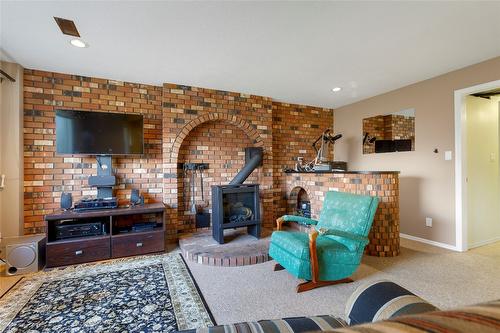 3985 15 Avenue, Vernon, BC - Indoor Photo Showing Living Room With Fireplace