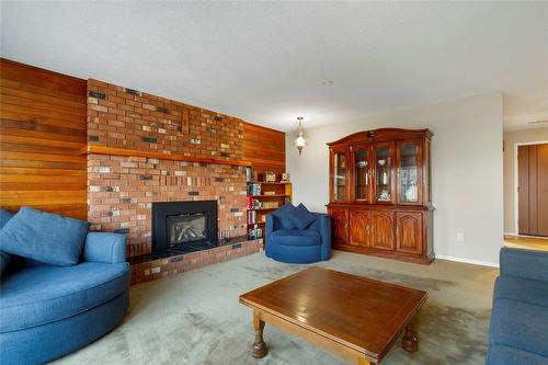 3985 15 Avenue, Vernon, BC - Indoor Photo Showing Living Room With Fireplace