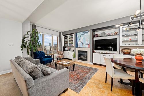 504-1160 Bernard Avenue, Kelowna, BC - Indoor Photo Showing Living Room With Fireplace