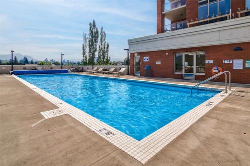 504-1160 Bernard Avenue, Kelowna, BC - Outdoor With In Ground Pool