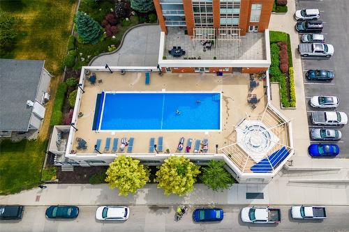 504-1160 Bernard Avenue, Kelowna, BC - Outdoor With In Ground Pool