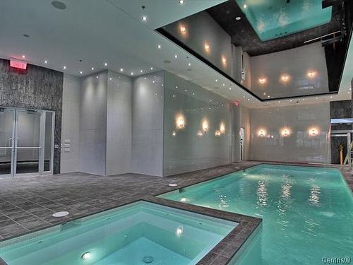 Pool - 400-1211 Boul. Robert-Bourassa, Montréal (Ville-Marie), QC - Indoor Photo Showing Other Room With In Ground Pool