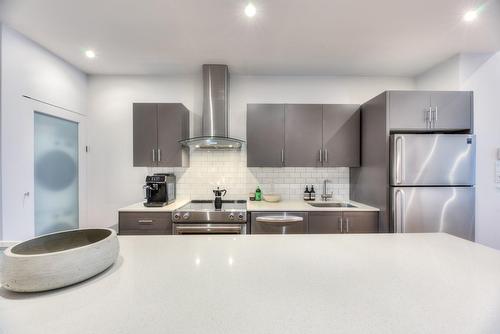 Kitchen - 1438 Rue Joliette, Montréal (Mercier/Hochelaga-Maisonneuve), QC - Indoor Photo Showing Kitchen With Upgraded Kitchen