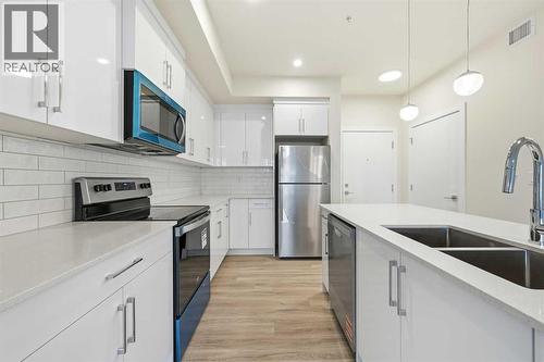 2221, 15 Skyview Point Crescent Ne, Calgary, AB - Indoor Photo Showing Kitchen With Stainless Steel Kitchen With Double Sink With Upgraded Kitchen