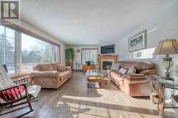 LIVING ROOM WITH GAS FIREPLACE - 