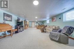 HUGE REC ROOM WITH ABOVE GRADE WINDOWS - 