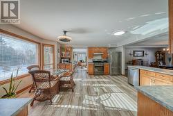 CUSTOM KITCHEN WITH BREAKFAST AREA - 