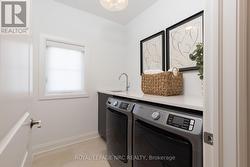 Main Floor Laundry - - 