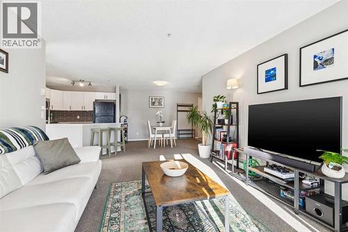 1215, 8810 Royal Birch Boulevard, Calgary, AB - Indoor Photo Showing Living Room