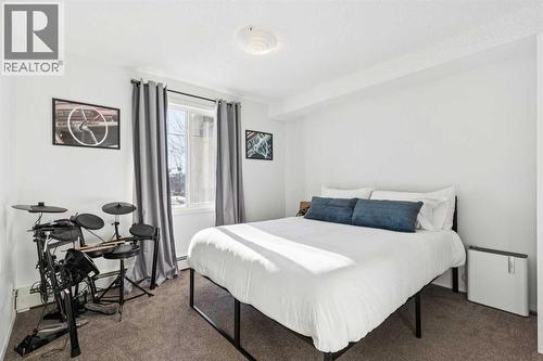 1215, 8810 Royal Birch Boulevard, Calgary, AB - Indoor Photo Showing Bedroom
