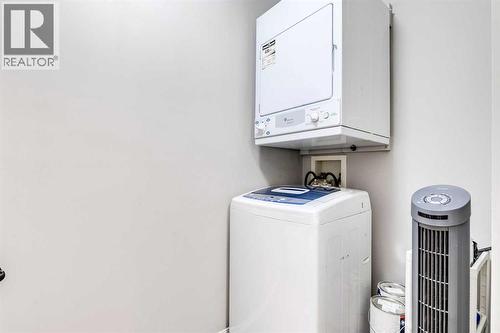 1215, 8810 Royal Birch Boulevard, Calgary, AB - Indoor Photo Showing Laundry Room