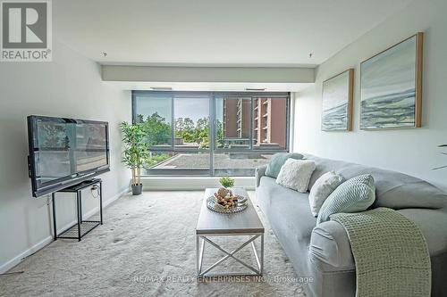 408 - 1400 Dixie Road, Mississauga, ON - Indoor Photo Showing Living Room