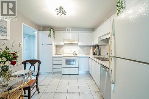 408 - 1400 Dixie Road, Mississauga, ON - Indoor Photo Showing Kitchen With Double Sink