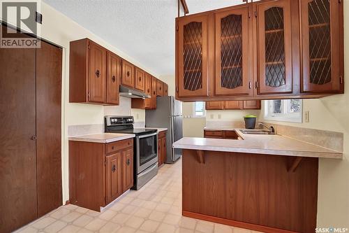 211 Main Street, Vanscoy, SK - Indoor Photo Showing Kitchen With Double Sink