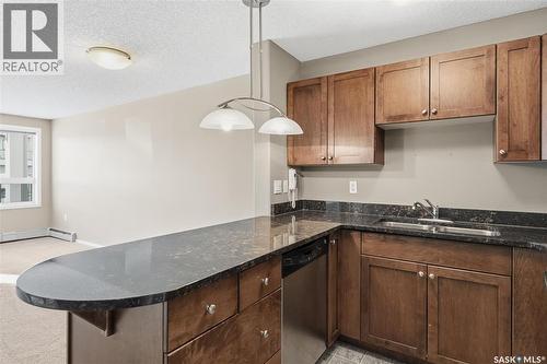 118 150 Pawlychenko Lane, Saskatoon, SK - Indoor Photo Showing Kitchen With Double Sink