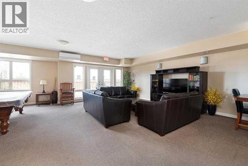 223, 4102 69 Avenue, Lloydminster, AB - Indoor Photo Showing Other Room With Fireplace