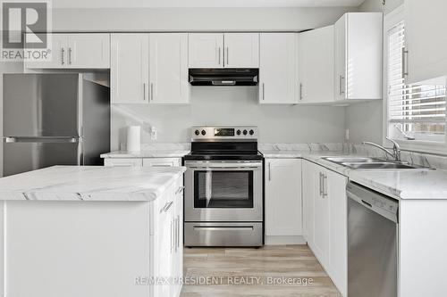 26 - 7768 Ascot Circle, Niagara Falls, ON - Indoor Photo Showing Kitchen With Double Sink With Upgraded Kitchen