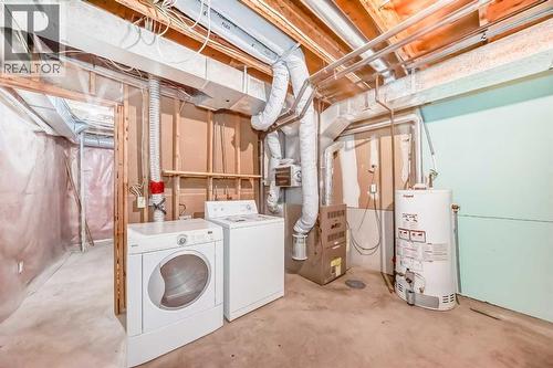 1, 642 Mcdougall Road Ne, Calgary, AB - Indoor Photo Showing Laundry Room