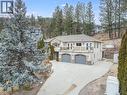Well-maintained home with strong curb appeal, valley views, and ample driveway parking. - 2034 Horizon Drive, West Kelowna, BC  - Outdoor With Deck Patio Veranda With Facade 