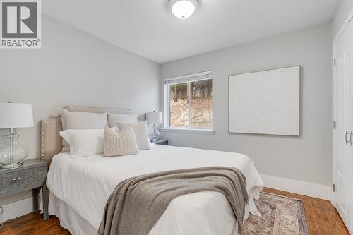 Additional bedroom suitable for guests, children, or a home office. - 2034 Horizon Drive, West Kelowna, BC - Indoor Photo Showing Bedroom