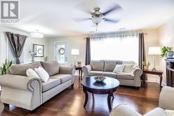 Gleaming Hardwood Floors in Living Room - 