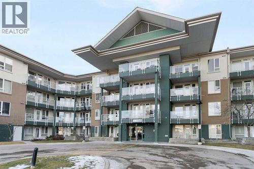 212, 3111 34 Avenue Nw, Calgary, AB - Outdoor With Balcony With Facade