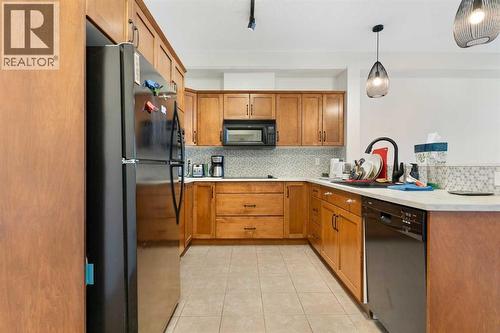 212, 3111 34 Avenue Nw, Calgary, AB - Indoor Photo Showing Kitchen