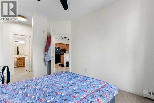 212, 3111 34 Avenue Nw, Calgary, AB - Indoor Photo Showing Bedroom