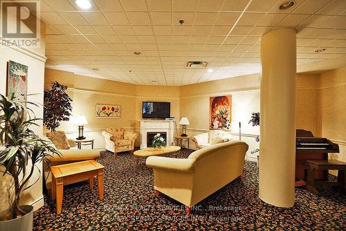 Ph03 - 7 Dayspring Circle, Brampton, ON - Indoor With Fireplace