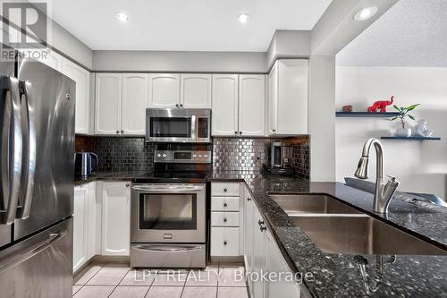 Ph06 - 51 Baffin Court, Richmond Hill, ON - Indoor Photo Showing Kitchen With Double Sink