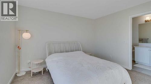 18 Amblehurst Path Nw, Calgary, AB - Indoor Photo Showing Bedroom