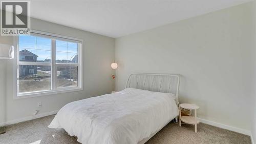 18 Amblehurst Path Nw, Calgary, AB - Indoor Photo Showing Bedroom