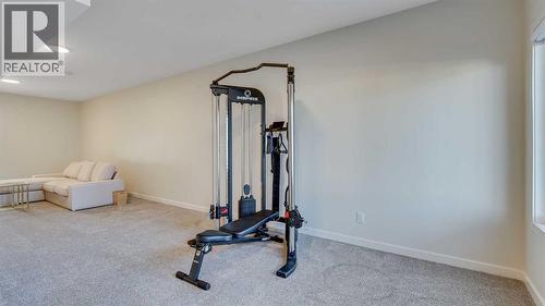 18 Amblehurst Path Nw, Calgary, AB - Indoor Photo Showing Gym Room