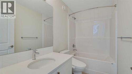 18 Amblehurst Path Nw, Calgary, AB - Indoor Photo Showing Bathroom