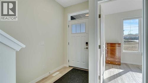 18 Amblehurst Path Nw, Calgary, AB - Indoor Photo Showing Other Room