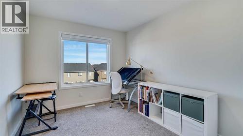 18 Amblehurst Path Nw, Calgary, AB - Indoor Photo Showing Other Room