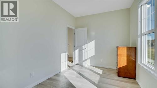 18 Amblehurst Path Nw, Calgary, AB - Indoor Photo Showing Other Room