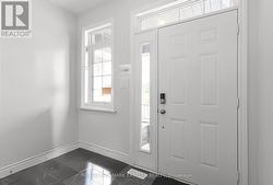 Foyer w/porcelain tile & large closet (not shown) - 