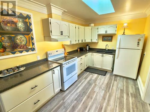 4 Main Road, Plate Cove West, NL - Indoor Photo Showing Kitchen With Double Sink
