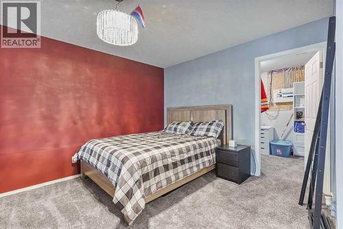 95048 River Ridge Road, Rural Lethbridge County, AB - Indoor Photo Showing Bedroom