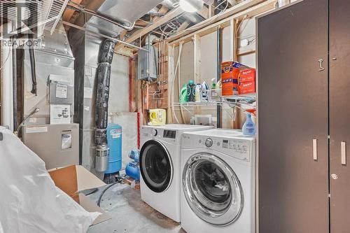95048 River Ridge Road, Rural Lethbridge County, AB - Indoor Photo Showing Laundry Room
