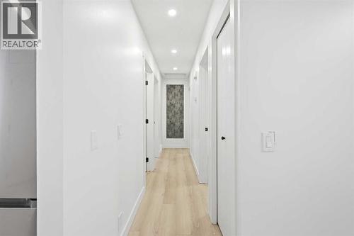 Hallway - main - 2404 51 Street Ne, Calgary, AB - Indoor Photo Showing Other Room