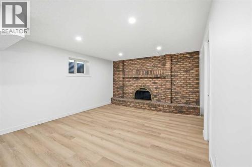 2404 51 Street Ne, Calgary, AB - Indoor With Fireplace