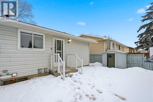 Backyard - 2404 51 Street Ne, Calgary, AB - Outdoor With Exterior