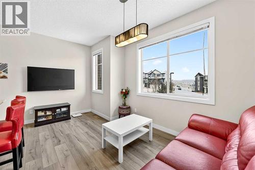403 Sage Hill Grove Nw, Calgary, AB - Indoor Photo Showing Living Room With Fireplace