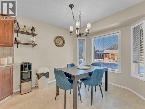 23 Ross Haven Avenue Se, Medicine Hat, AB - Indoor Photo Showing Dining Room