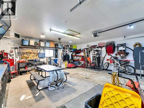 23 Ross Haven Avenue Se, Medicine Hat, AB - Indoor Photo Showing Garage