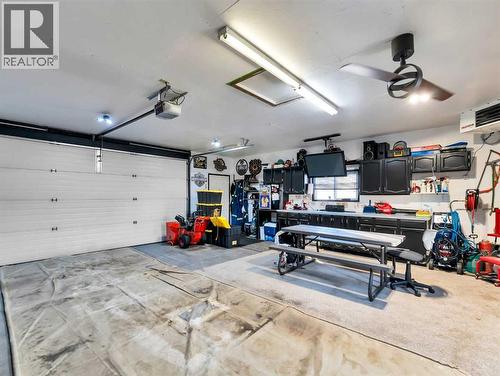 23 Ross Haven Avenue Se, Medicine Hat, AB - Indoor Photo Showing Garage