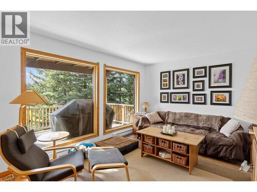 Family room off kitchen - 9245 Paradise Road, Kelowna, BC - Indoor Photo Showing Living Room