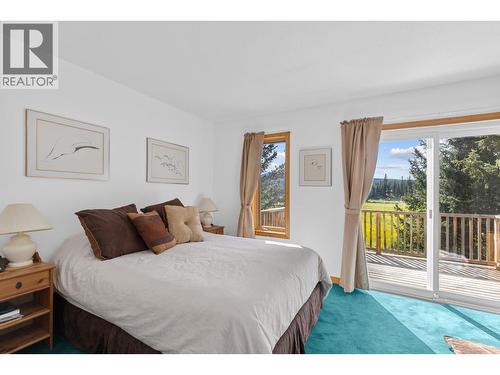 Primary bedroom - 9245 Paradise Road, Kelowna, BC - Indoor Photo Showing Bedroom
